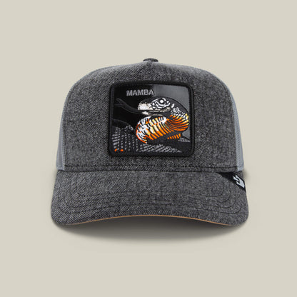 The Mamba by Goorin Bros. is a gray cap with a rectangular patch showcasing an embroidered black and orange mamba snake and the word "MAMBA"—a bold hat that embodies the predator mindset.
