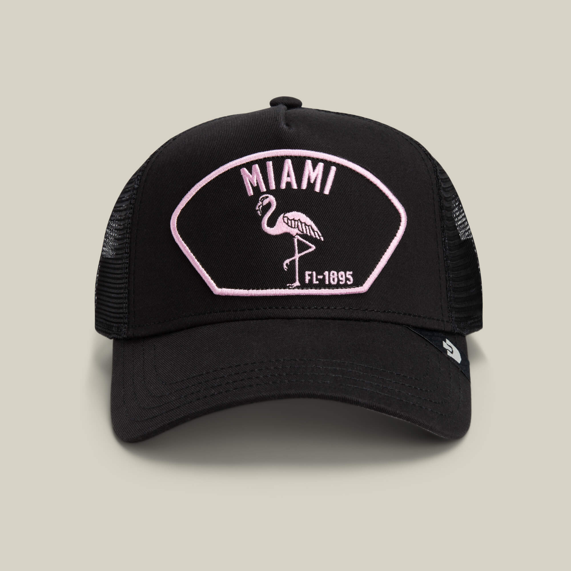 Show off your South Beach style with the VOID-colored "Miami" mesh cap by Goorin Bros., featuring a pink and white patch with a flamingo and FL-1895 text on the front.