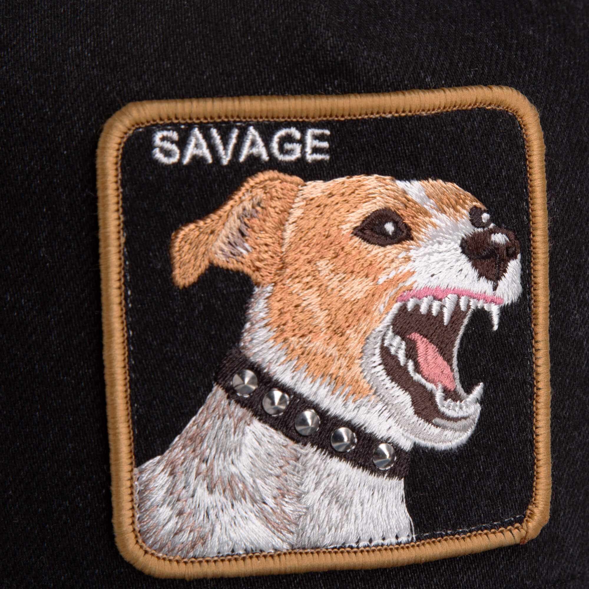 The Savage Dawg embroidered patch by Goorin Bros. features a snarling dog with a studded collar and "SAVAGE" above—perfect for adding edge to your black denim hat or customizing a dog patch cap.