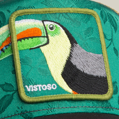 The Goorin Bros. Belize Toucan is a green trucker hat with a stitched patch featuring an embroidered toucan and "VISTOSO" in white text.