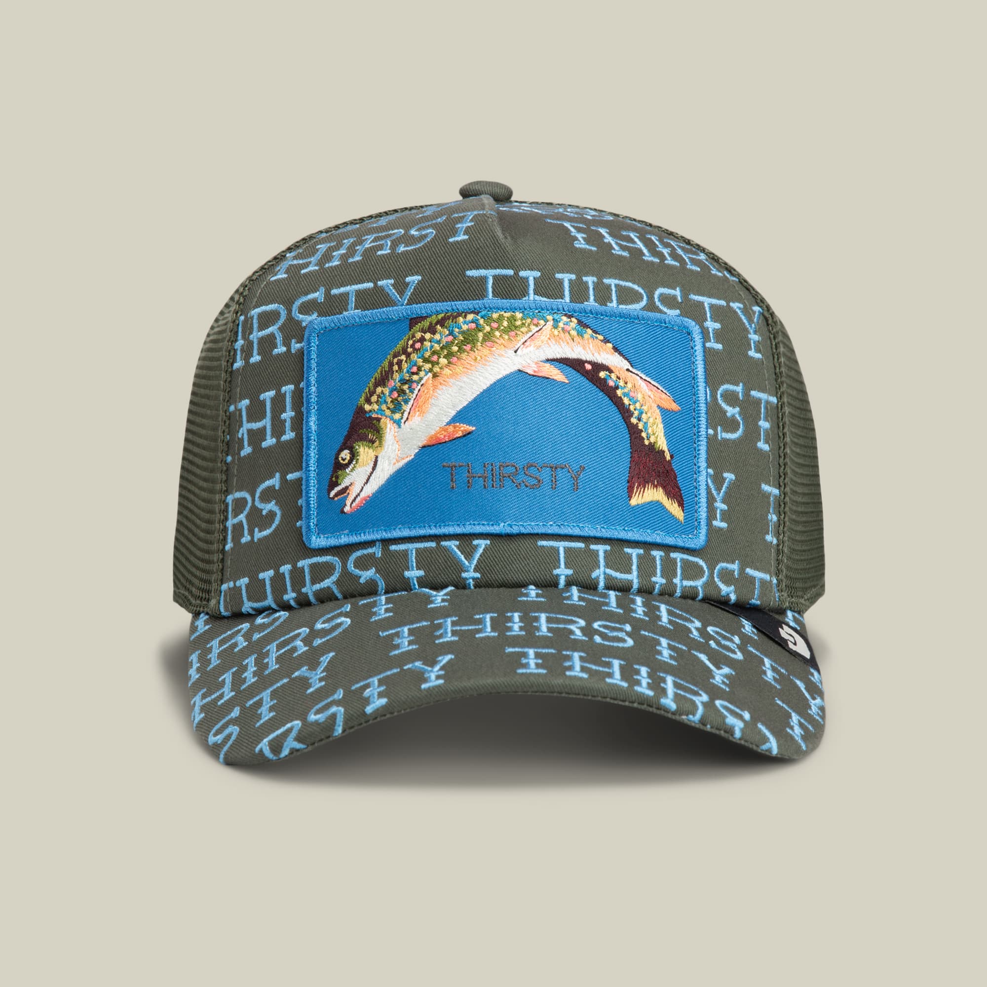 The Thirsty Thursday trucker hat by Goorin Bros. features a gray mesh back, blue front panel with an embroidered fish patch, and repeating text, displayed against a neutral background.