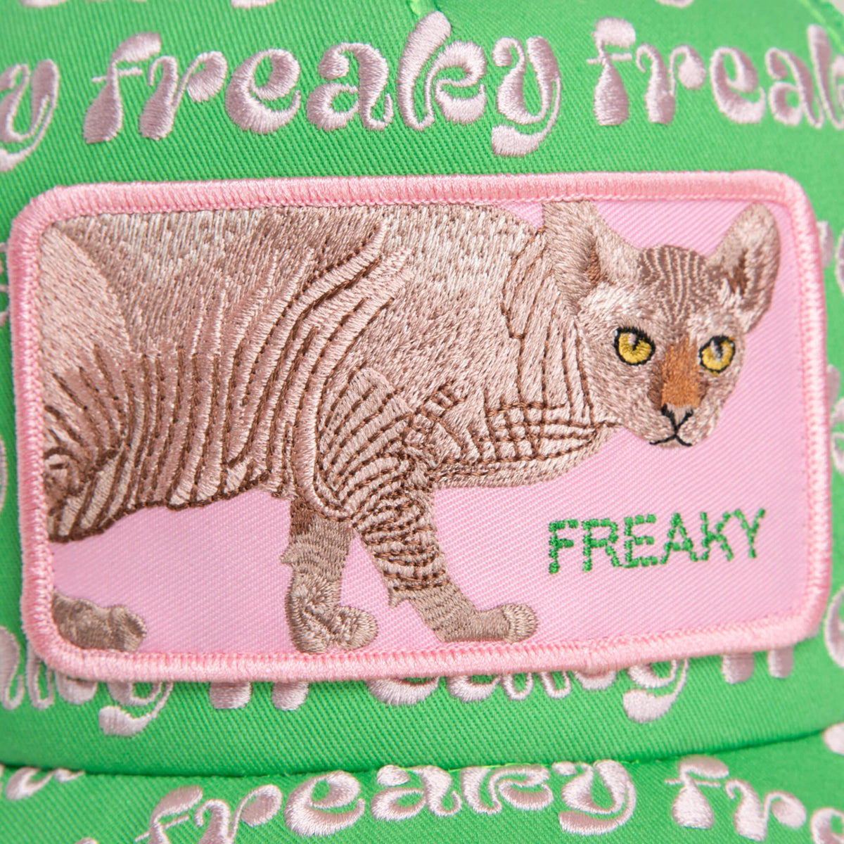 The Freaky Friday patch by Goorin Bros. features an embroidered Sphynx cat and "FREAKY" on green fabric with repeat freaky text—perfect for bold personalities eager to show off their wild side.