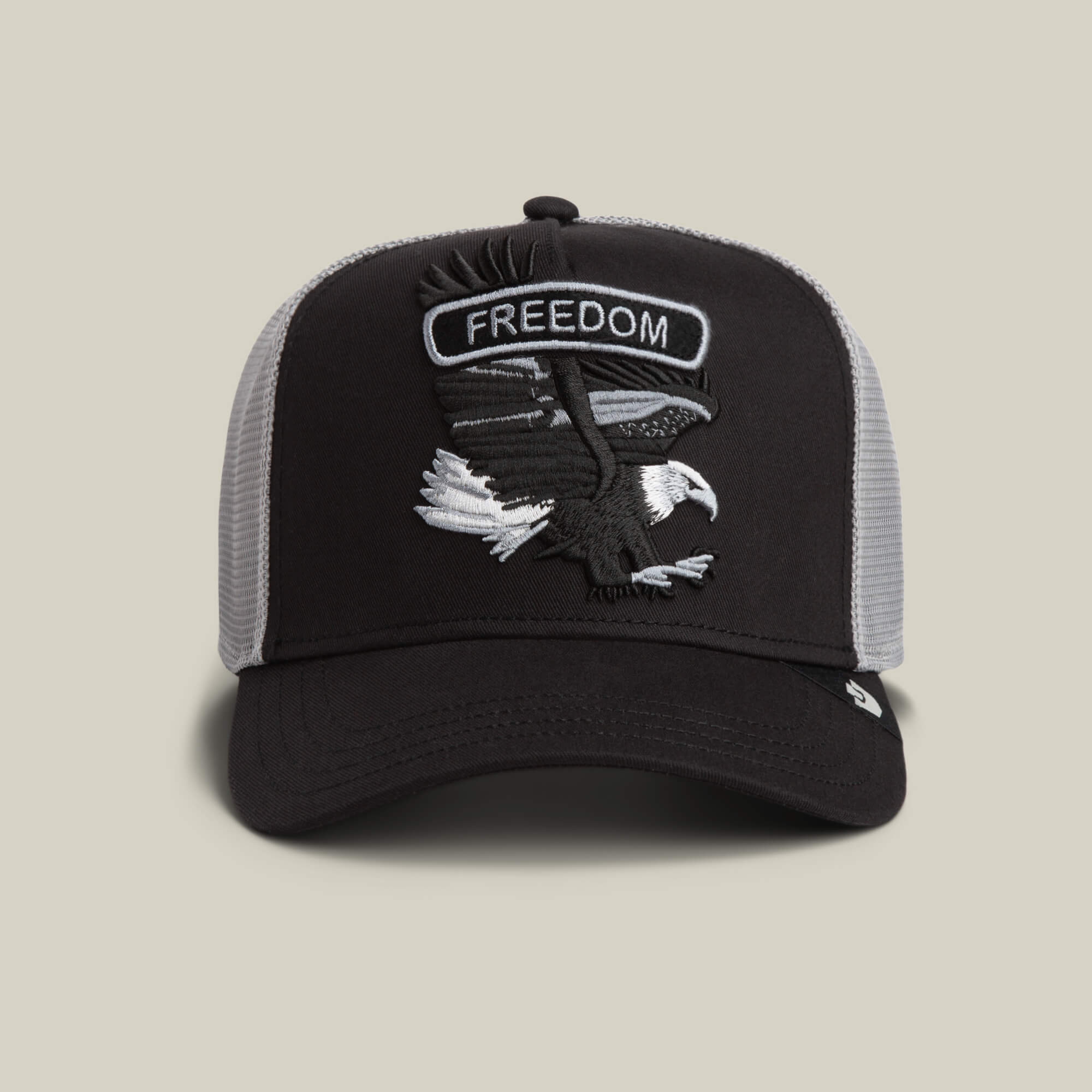 The Goorin Bros. Classic Rocker - Freedom hat in VOID color features a rocker vibe with an embroidered bald eagle patch and FREEDOM on the front panel.