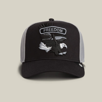 The Goorin Bros. Classic Rocker - Freedom hat in VOID color features a rocker vibe with an embroidered bald eagle patch and FREEDOM on the front panel.