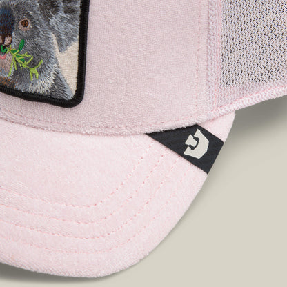 Close-up of the Goorin Bros. Terry Cloth Koala hat in pale pink, featuring a mesh back, a koala patch, and a small black tag with a white logo on the brim.