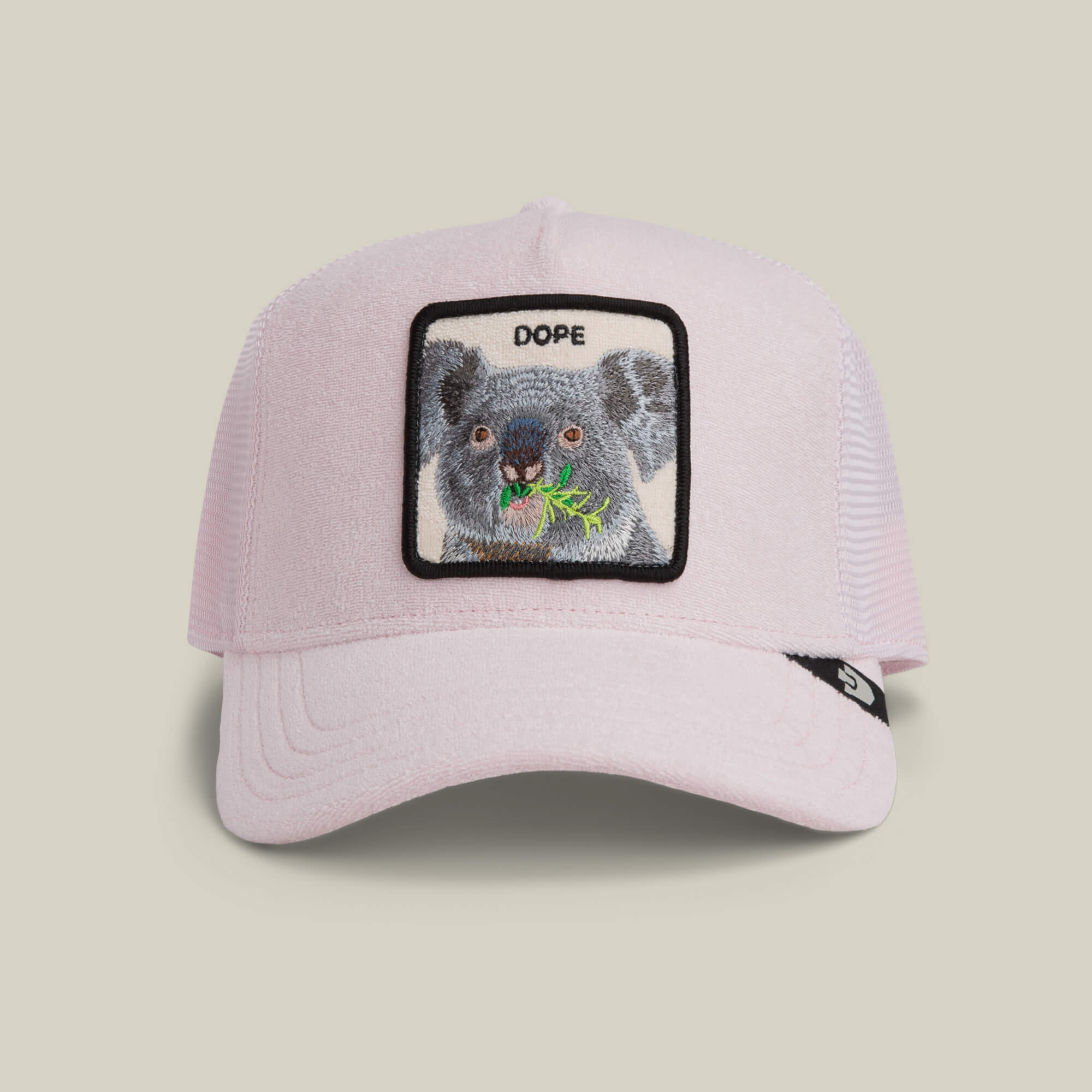 The Goorin Bros. Terry Cloth Koala hat in WHISPER features a patch with an embroidered koala eating leaves and “DOPE” above it, combining playful style and cozy vibes.