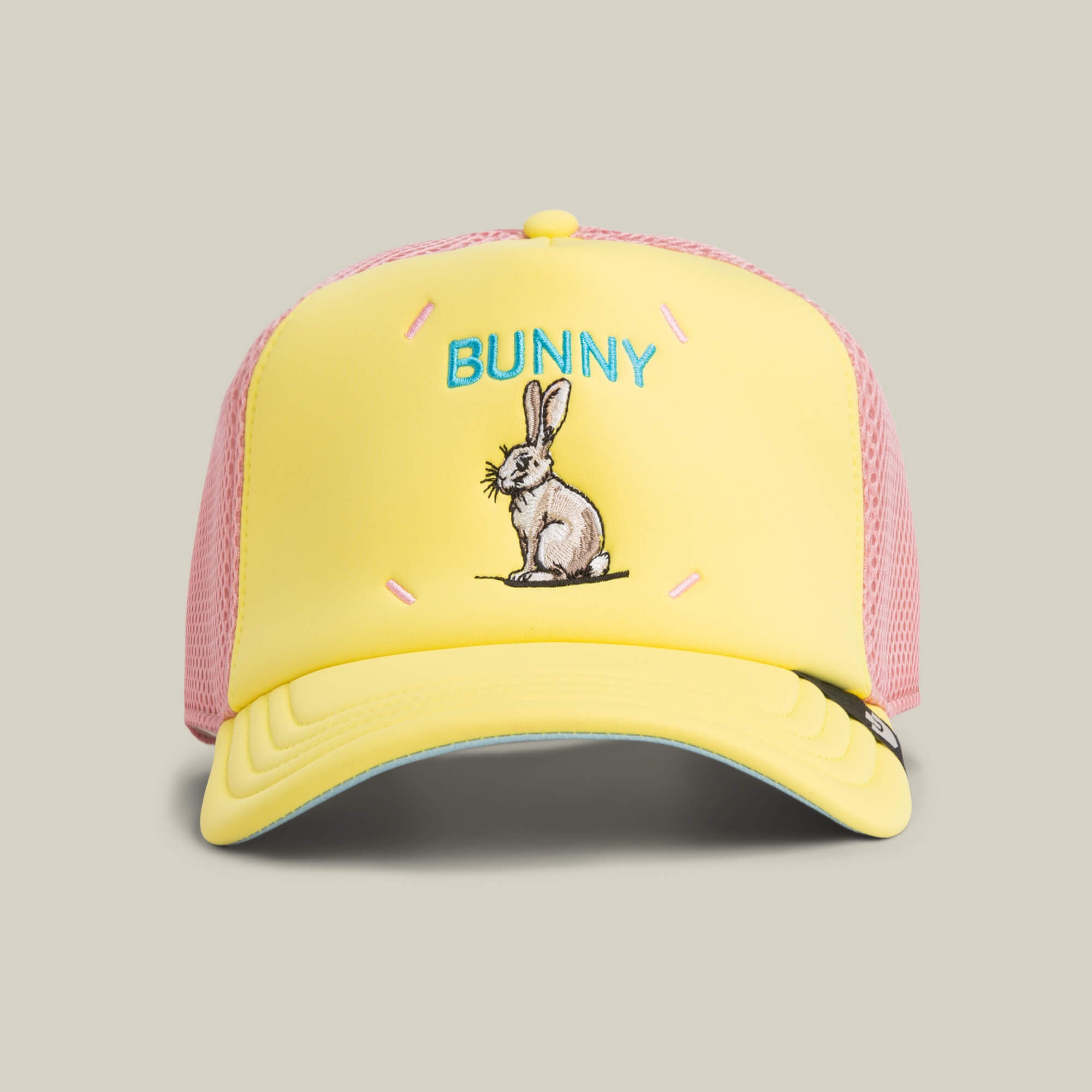 The Goorin Bros. Neo Farm - Bunny Rabbit hat in GLOW features mesh panels, an embroidered bunny illustration, and the word “BUNNY” on the front—a playful cap perfect for everyday wear.