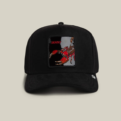 The Goorin Bros. Black Out Scorpion hat in VOID features bold red “DEADLY” text and a striking scorpion patch on black suede.