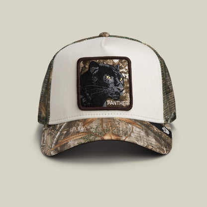 The Goorin Bros. Realtree Edge Black Panther trucker hat features a camouflage bill and mesh, with a front panel patch displaying a panther and the word “PANTHER” embroidered below.