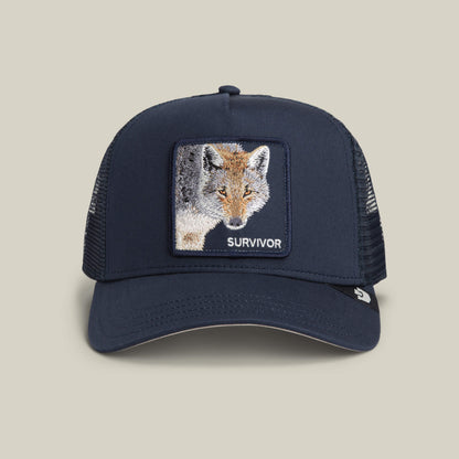 The Mirage Survivor by Goorin Bros. is a standout EDGE trucker hat with a mesh back and front patch showcasing an embroidered fox and SURVIVOR—perfect for your everyday adventures.