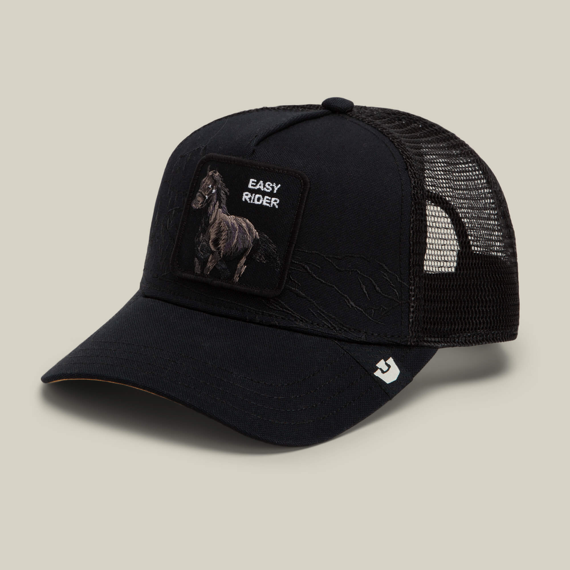 Badlands Stallion trucker hat by Goorin Bros., featuring black mesh, a horse patch, and "EASY RIDER" text on the front, shown at an angle against a neutral background.