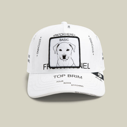 The Goorin Bros. K.I.S.S. BLANK baseball cap features black text, diagram-style labels, and a dog illustration patch on the front. This limited edition piece is a unique addition to any collection.