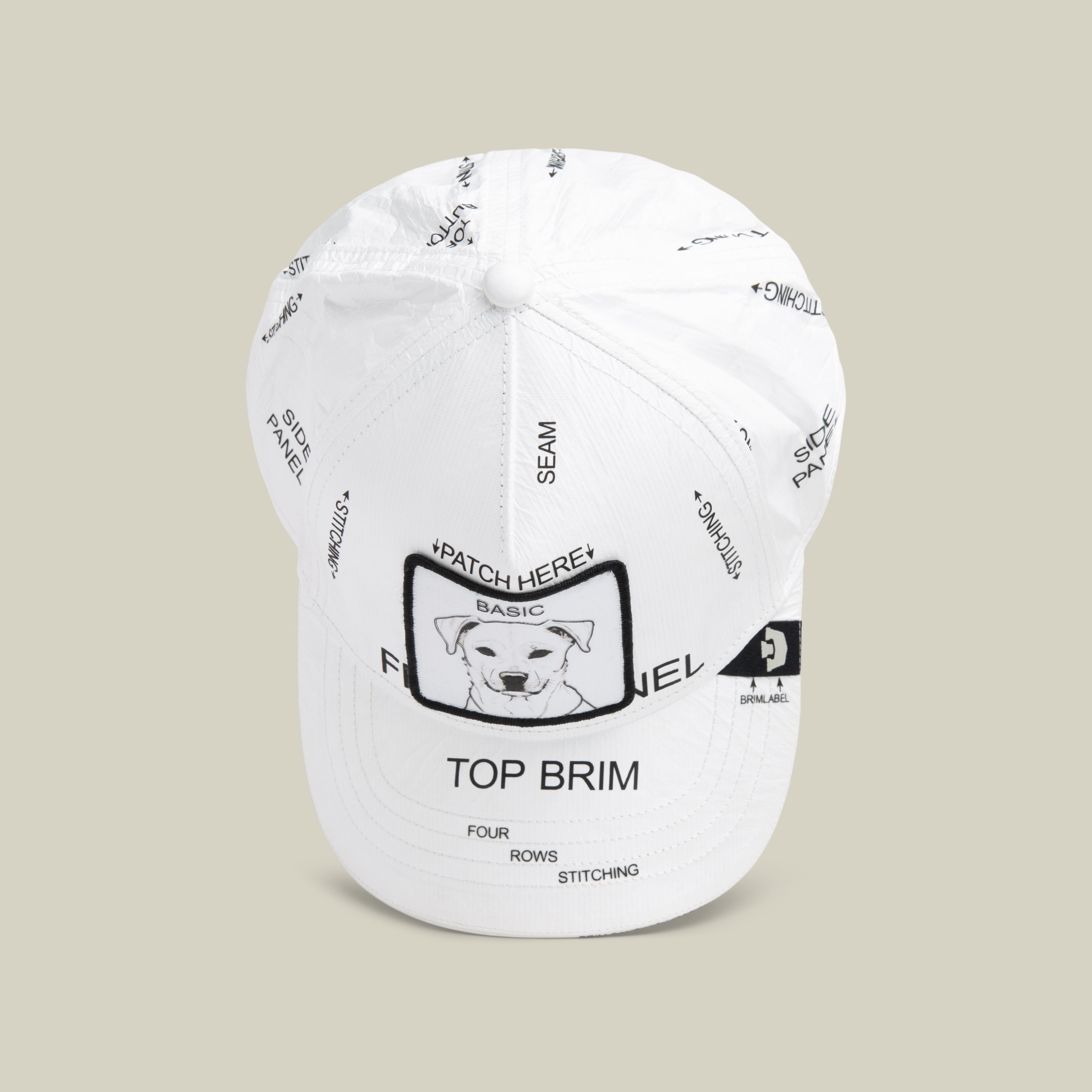 Limited edition K.I.S.S. white baseball cap by Goorin Bros., featuring labeled sections and a simple dog illustration on the front, displayed against a plain beige background.