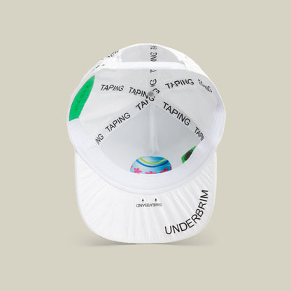 A white limited edition Goorin Bros. K.I.S.S. baseball cap viewed from underneath, featuring black TAPING text along the interior seams and UNDERBRIM text printed at the front edge of the brim.