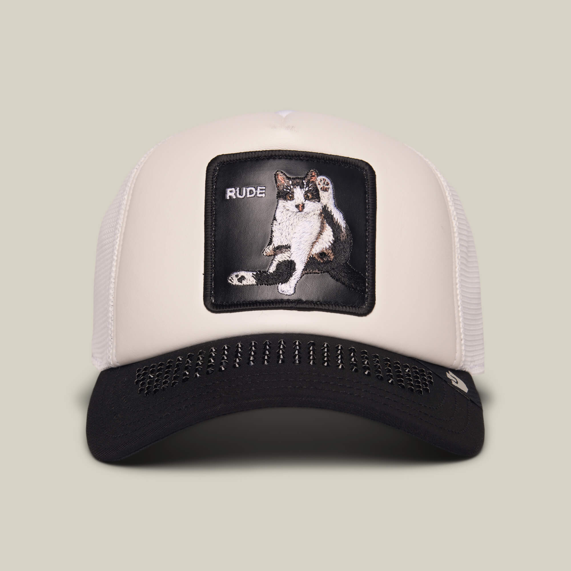 The "R U Done Eating?" cap by Goorin Bros. in blank features a patch with an illustrated cat raising its paw and the word RUDE embroidered, giving off a playful vibe.