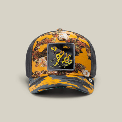 A LUCKY camo trucker hat by Goorin Bros., called Knight in Sliming Armor, features a mesh back and a Hero patch with a yellow and black frog—ideal for any Yellow Swamp Battalion fan.