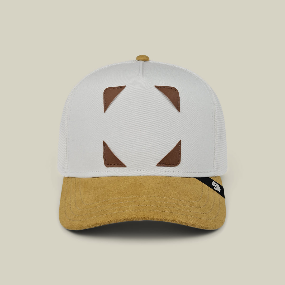 Goorin Bros. Gal Pals Patch Pack with GB Patch Corner Trucker - Tan hat with a white crown, tan brim, and four brown triangular animal patches at the corners.