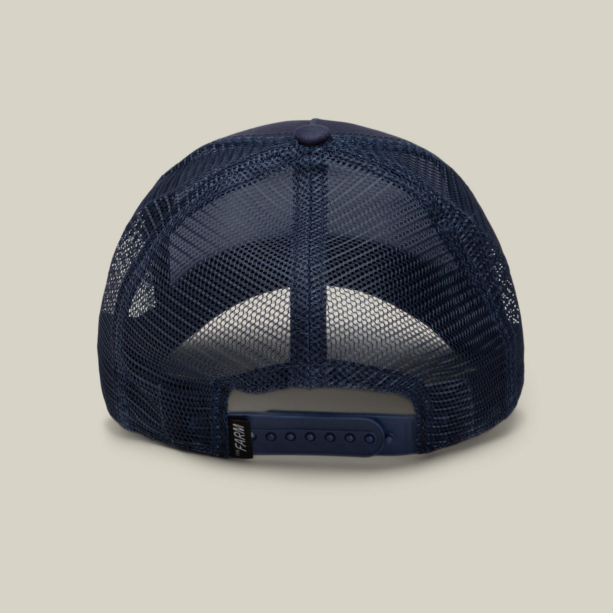 The Karlsson Moose by Goorin Bros. is a navy blue mesh trucker hat shown from the back, featuring an adjustable snapback closure and a small black tag—a moose-worthy lid.