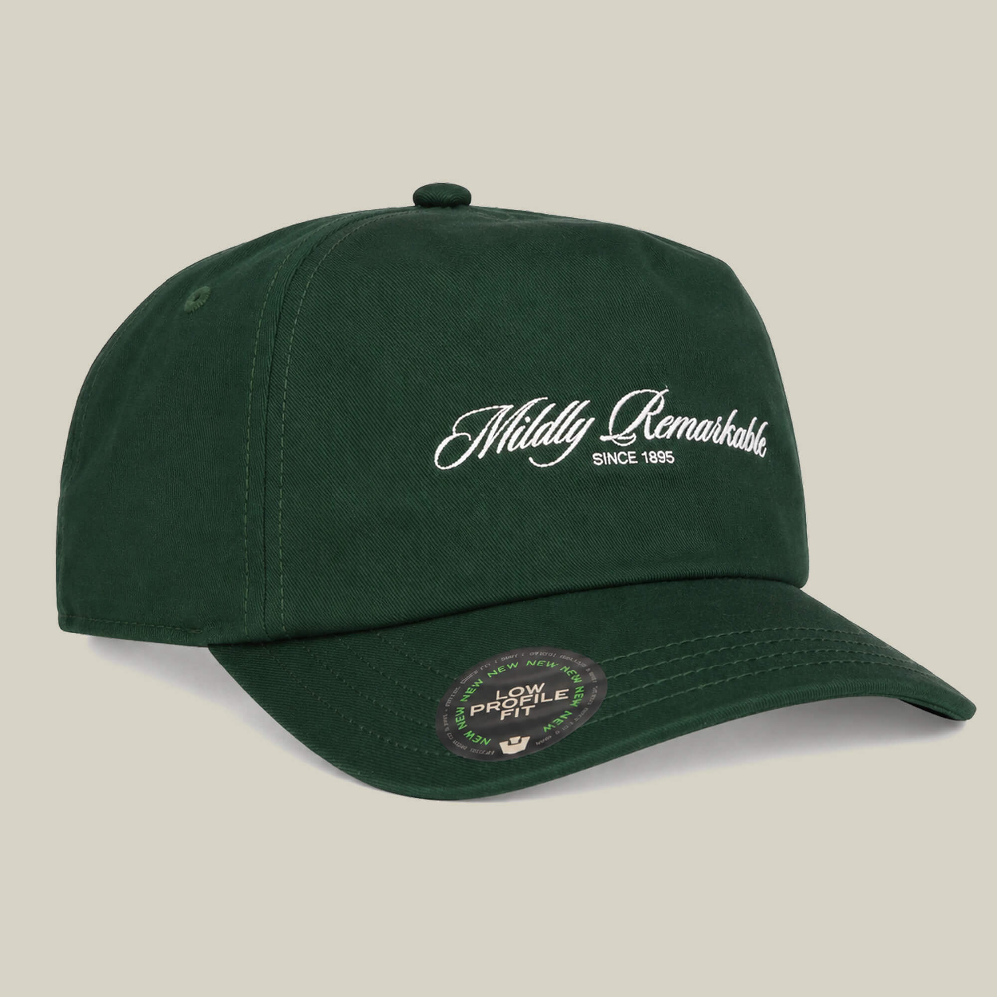 The Goorin Bros. Mildly Remarkable Script hat features dark green fabric, classic "SINCE 1995" embroidery on the front, and a Low Profile sticker—perfect for fans of a low pro fit.