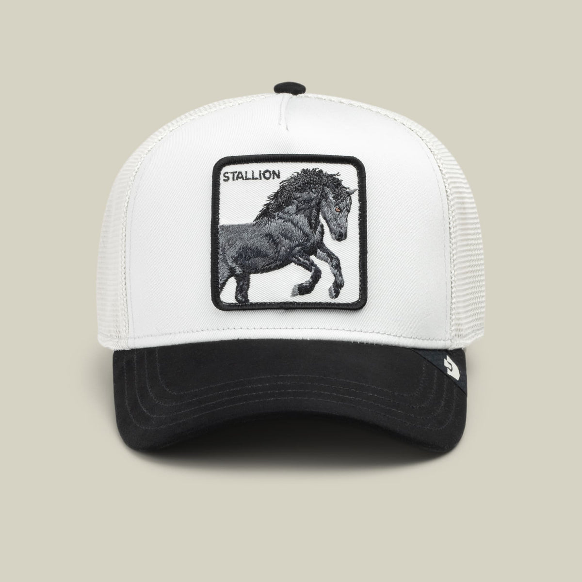 The Goorin Bros. Digital Stallion is a black and white trucker hat featuring a mesh back panel and an embroidered stallion patch on the front, displayed against a neutral studio background.