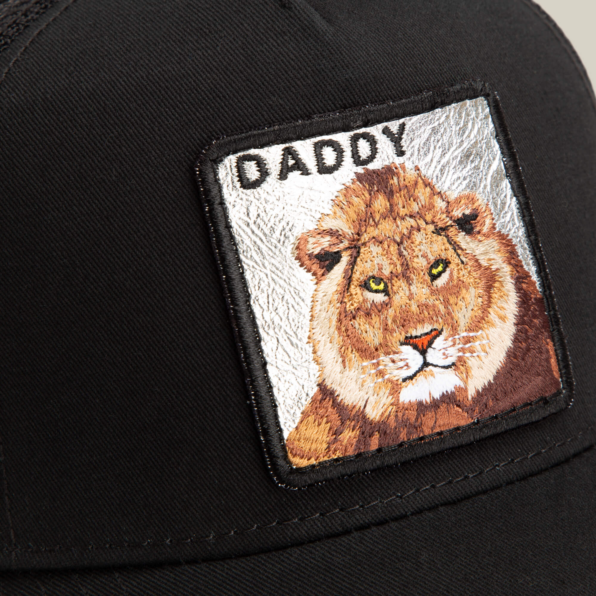 The Goorin Bros. Daddy King is a black mesh cap with a lion patch and "DADDY" embroidered above it. Limited edition for true King Daddy style.