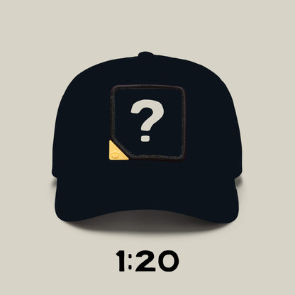 The Goorin Bros. Blind Box 1: U R WUT U EET baseball cap features a black design with a patch showing a white question mark and yellow detail, plus "1:20" below—perfect for mystery hat collectors.