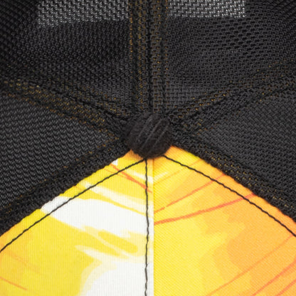 It Was The Hat by Goorin Bros is a black knit beanie with yellow and orange colorblock stripes, shown in a close-up detail shot styled with athletic wear.