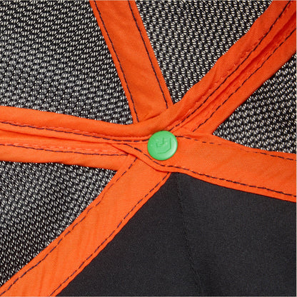 The Know Ball by Goorin Bros features a structured design with black mesh fabric panels, bright orange binding and straps, and a green button detail at the center, displayed in a flat lay close-up shot.