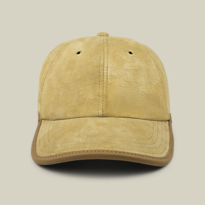 Front view of the Goorin Bros. Steiner cap in Khaki Tan, featuring a curved brim and two ventilation holes on the crown, set against a plain beige background.
