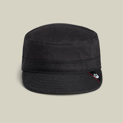 The Goorin Bros. Home at Last is a stylish black military-style cap with a short flat brim and a small logo tag on the front right side, shown against a plain beige background.