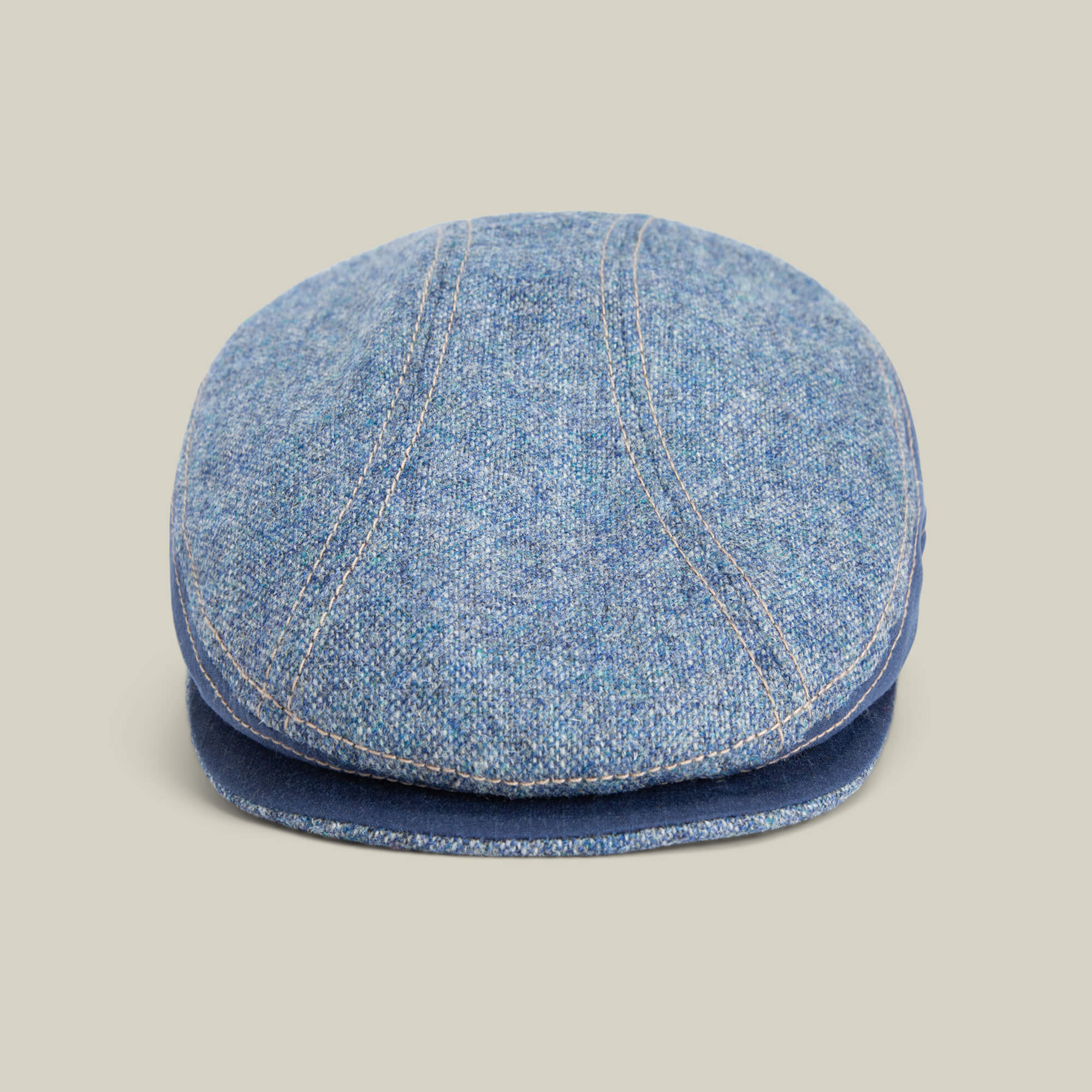 The Goorin Bros. Full Wattage flatcap in CELESTIAL features a classic silhouette and visible stitching, displayed against a plain beige background.