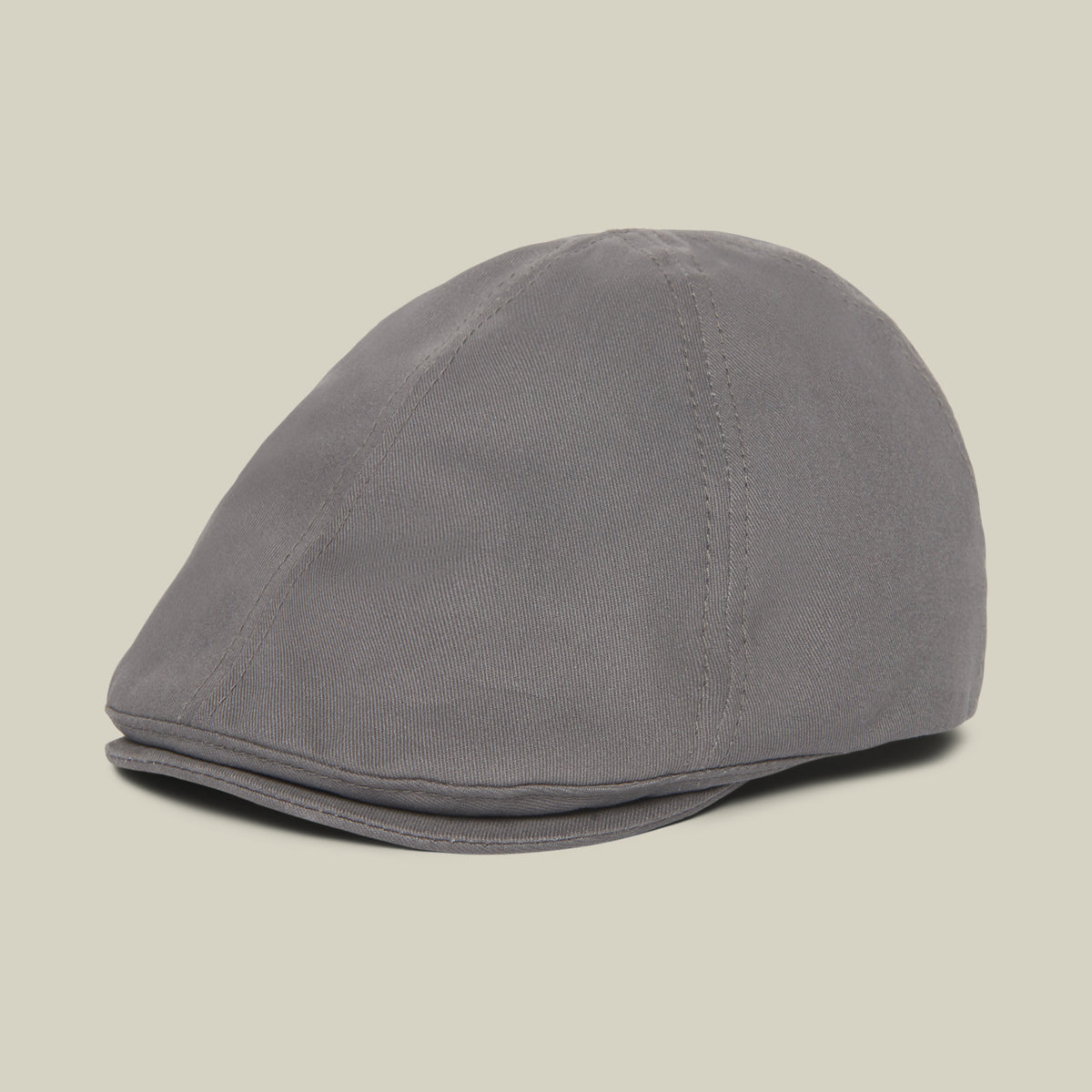 The Goorin Bros. “Murray Way” flatcap in charcoal, crafted from 100% cotton with visible stitching, is displayed on a neutral background.