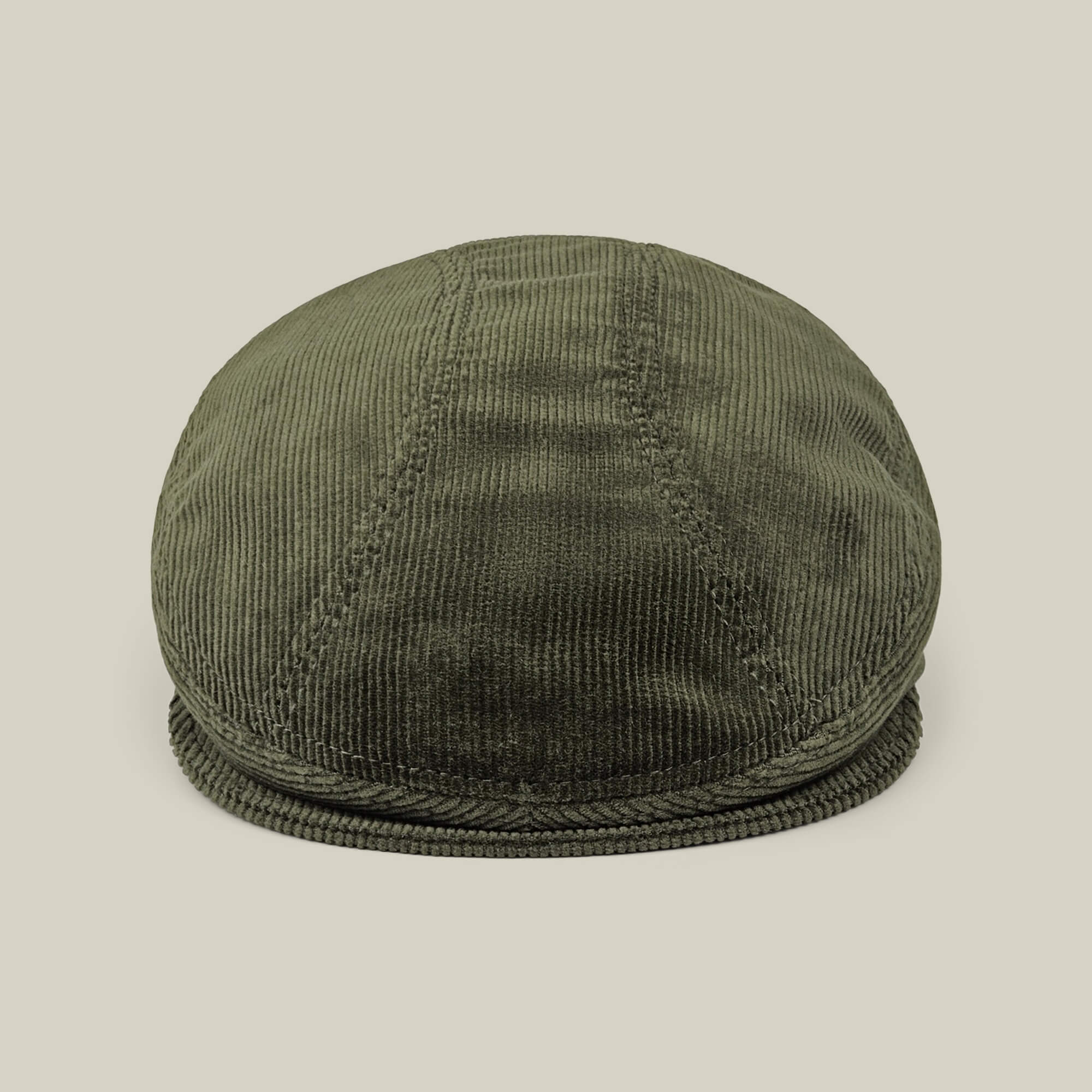 The Goorin Bros. Maxwell Park flatcap in olive green is shown against a plain, light beige background.