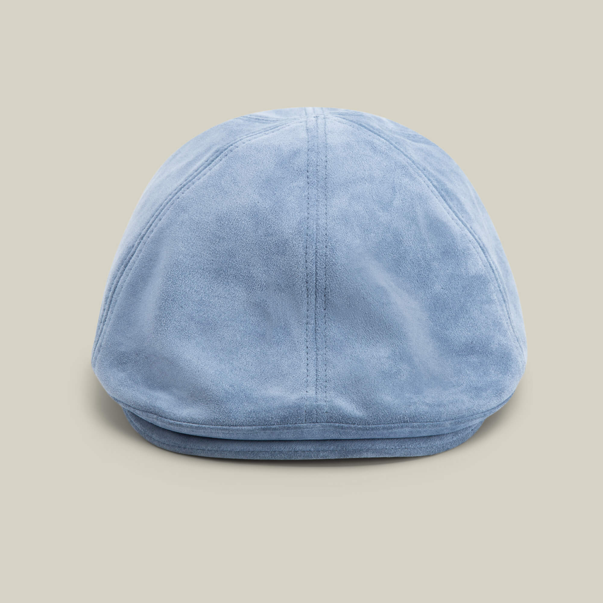 The Goorin Bros. Cushy Benjamin Paul flatcap in SHADOW is shown from the back against a plain beige background, highlighting this classic hat made in the USA.