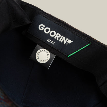 Close-up of the inside label on the Cozy Benjamin Paul hat by Goorin Bros., showing the brand name, year 1895, and a tag that reads “REMARKABLY WELL MADE.”.