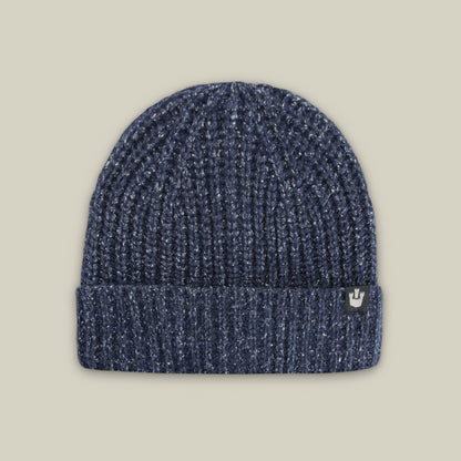 The Goorin Bros. Northstar is a dark blue ribbed knit beanie featuring a folded cuff and a small rectangular logo tag on the left side.