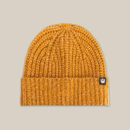 The Goorin Bros. Northstar is a luxurious mustard yellow knitted beanie with a folded brim and a small black tag featuring a white crown logo.