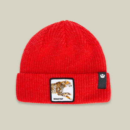 The Nonstop Beanie by Goorin Bros. in RUSH features a running cheetah patch with "NONSTOP" on the front and a small black cuff label—an essential winter hat for those always on the move.