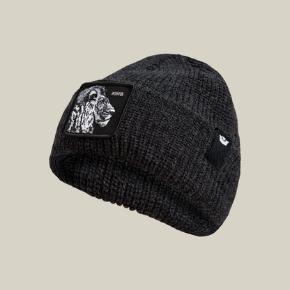 The Lion Beanie by Goorin Bros. is a black cuffed beanie with a lion patch and KING on the front, crafted in heavyweight knit for warmth and style.