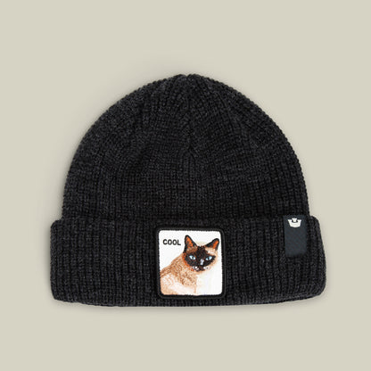 The Cool Beanie by Goorin Bros. in VOID features a ribbed knit design and a front patch with a Siamese cat illustration and "COOL"—a must-have streetwear accessory.