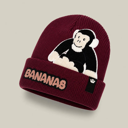 Keep cozy and stylish with the Goorin Bros. Double Stuffed - Bananas Beanie - big, a maroon knit beanie featuring double-layer warmth, a playful cartoon monkey in headphones, and “BANANAS” embroidered on the front cuff. This statement hat is perfect for cold-weather days, bringing fun flair to your winter wardrobe.
