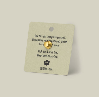 The Lone Wolf Trucker Pin by Goorin Bros. comes on a square card featuring tips for personalizing your hats or jackets and embracing your wolf energy.