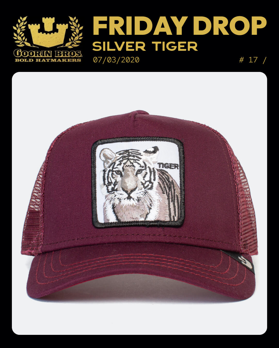 A maroon mesh trucker hat by Goorin, featuring a front patch with an illustrated white tiger and the word TIGER in the corner—perfect for fans of bold hat designs.