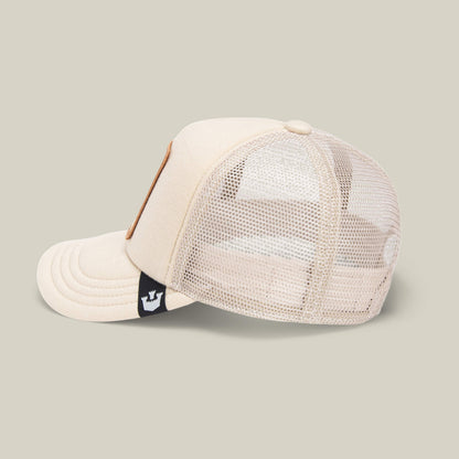 Cuddle Time kids cap by Goorin Bros. features beige and white colors, a mesh back, side logo tag, and curved brim—perfect for everyday comfort.