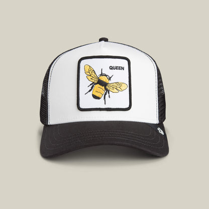 The Queen Bee Mini by Goorin Bros. is a black and white kids trucker cap with a front panel patch of a golden bee crowned with the label QUEEN.
