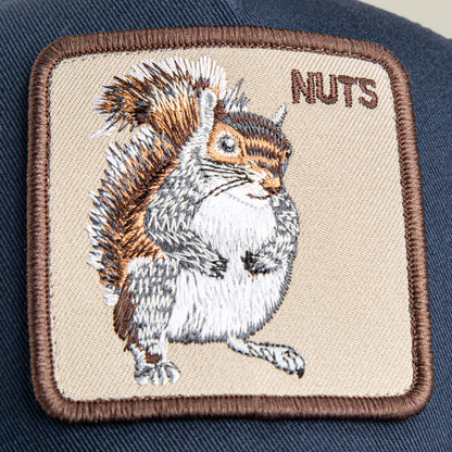 The Goorin Bros. Nuts Mini patch features an embroidered squirrel and "NUTS" on navy blue—perfect for your kid-sized cap or small hat.