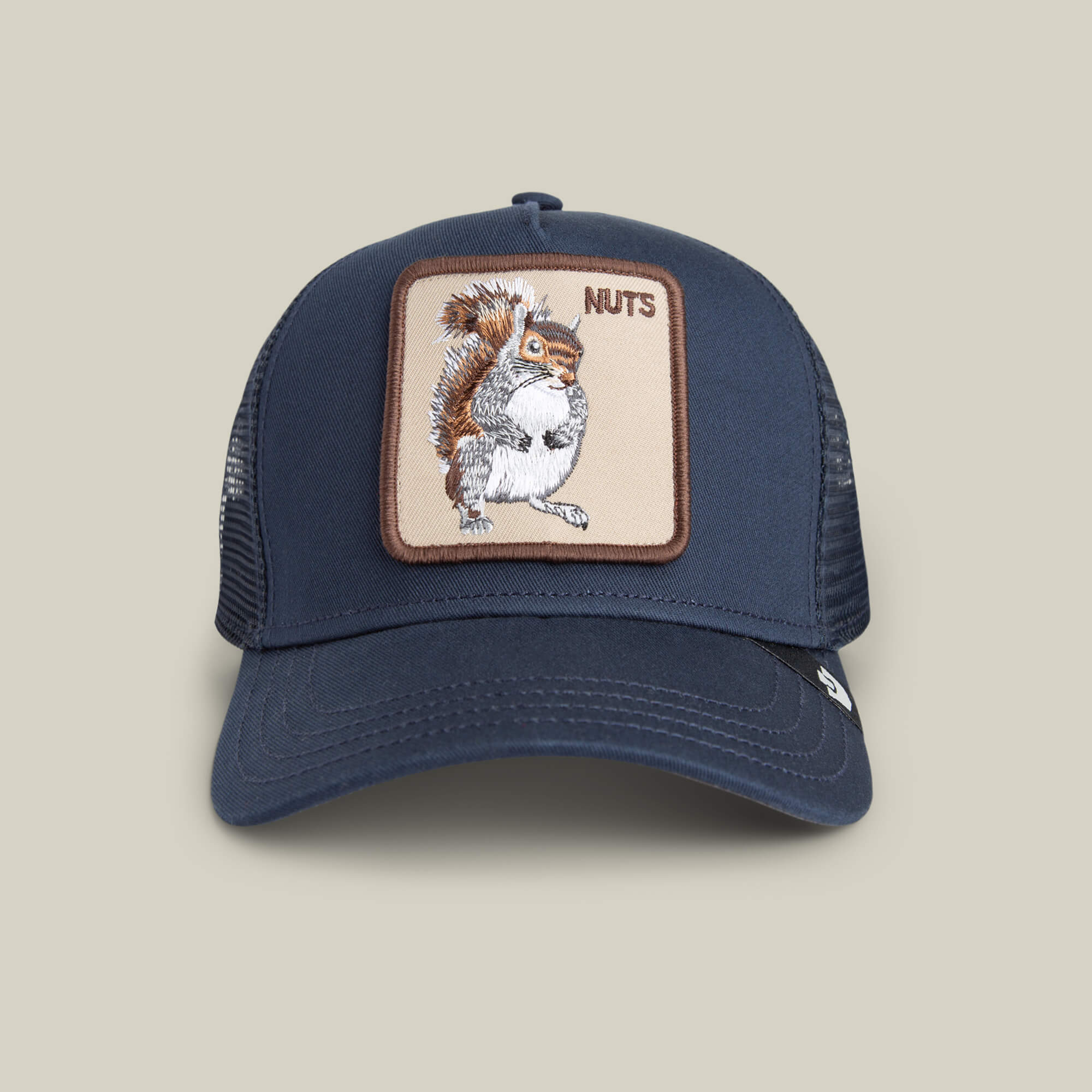 The Nuts Mini by Goorin Bros. is a blue kid-sized cap featuring a playful cartoon image and a fun squirrel patch on the front.
