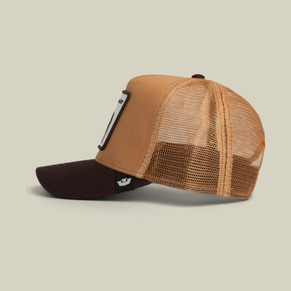 The Goorin Bros. Bad Boy Trucker Mini is a two-tone mesh trucker cap in tan and brown with a structured front panel and breathable mesh back, displayed in a studio setting against a neutral background.