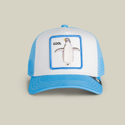 The Goorin Bros. Cool Penguin Mini trucker hat features a blue and white mesh design with an embroidered penguin patch and "cool" text on the front panel, displayed on a neutral background.
