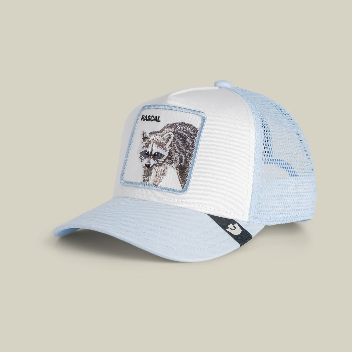 The Goorin Bros. Rascal Raccoon Mini trucker hat features a white front panel and light blue mesh back with a raccoon graphic patch and black brand stripe on the bill, displayed against a neutral background.